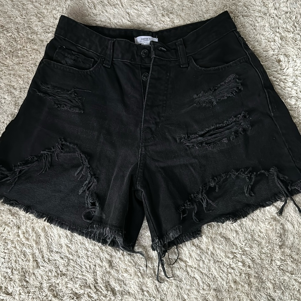 Black distressed shorts
